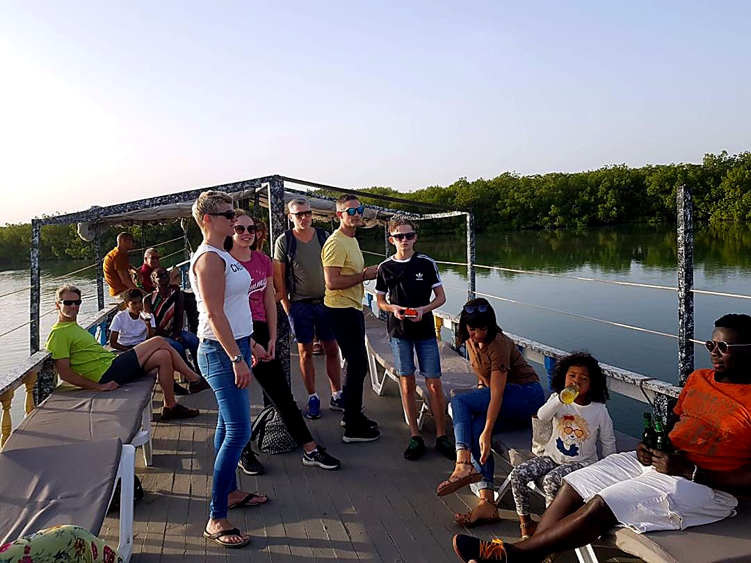 Guests enjoying a river cruise on deck