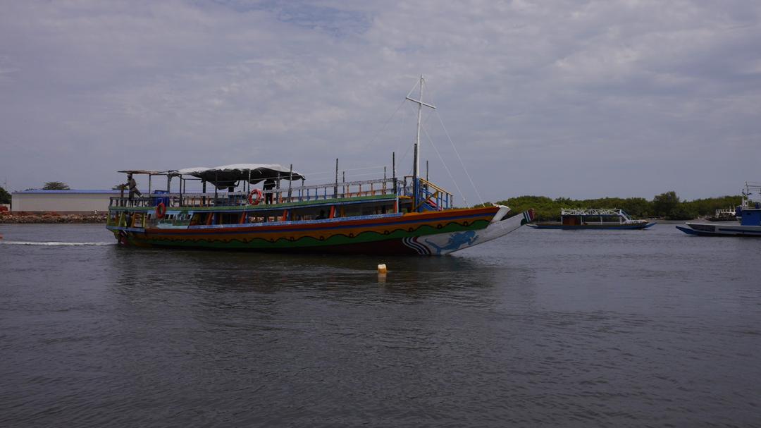 Colourful river excursion vessel in The Gambia
